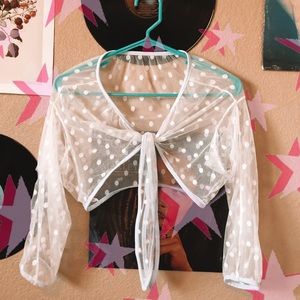 A mesh polka dot cover up